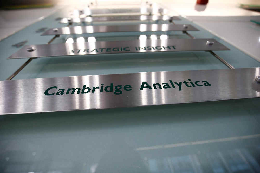 Cambridge Analytica planned to issue digital currency | Reuters